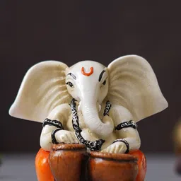 eCraftIndia White & Orange Lord Ganesha Idol Playing Tabla  Showpieces-image-16